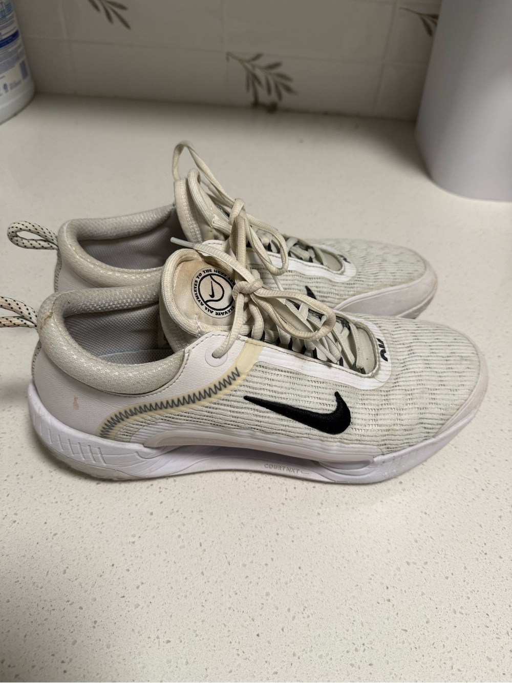 Nike Cream and Black Tennis Sneakers